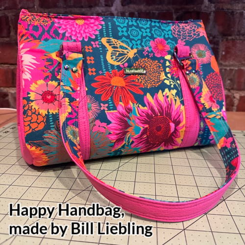 The Happy Handbag from Sewing Patterns by Mrs H made by Bill Liebling in bright floral fabric 